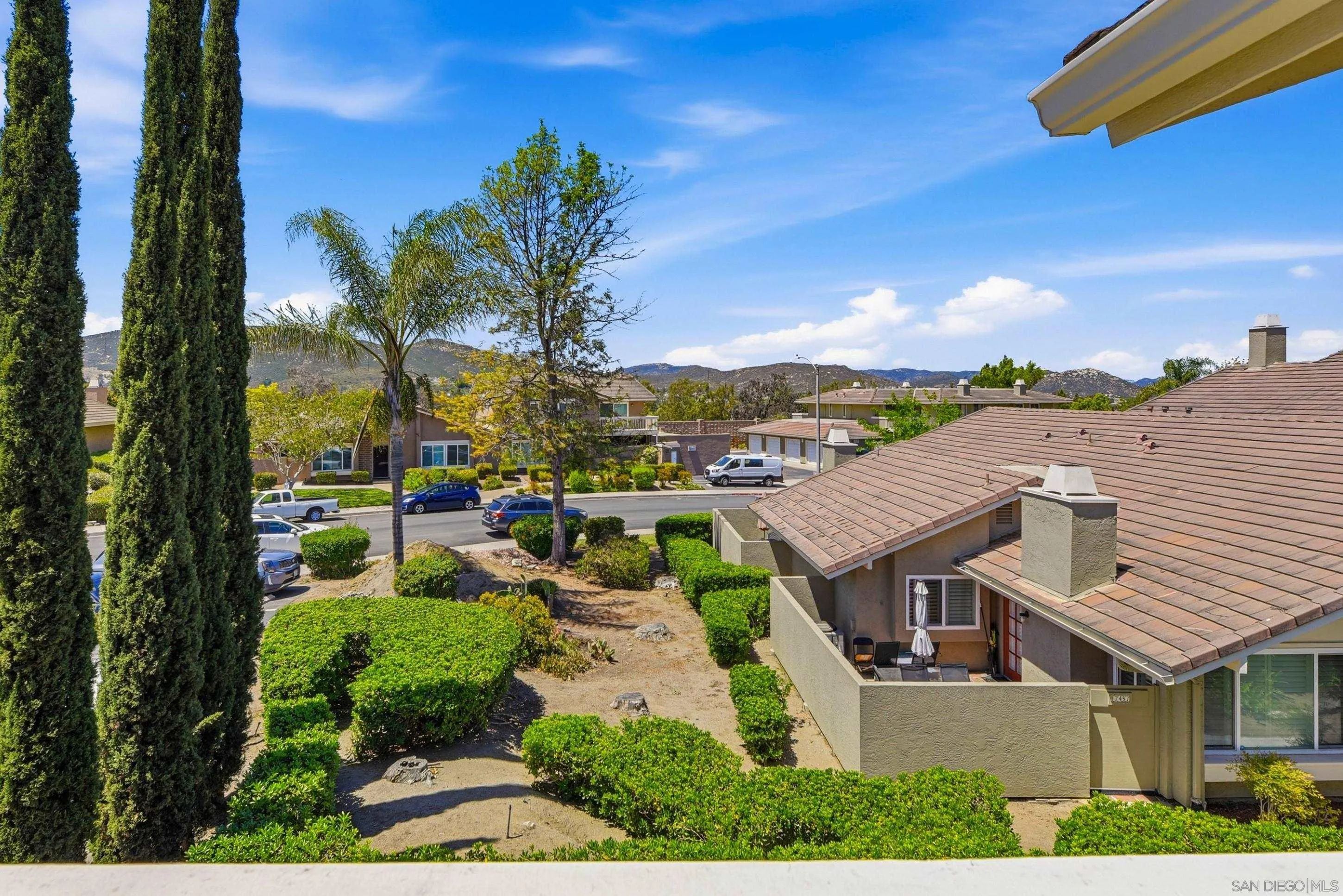 17443 Ashburton Road San Diego, CA 92128 - Photo 24 of 36 an aerial view of multiple houses with a yard