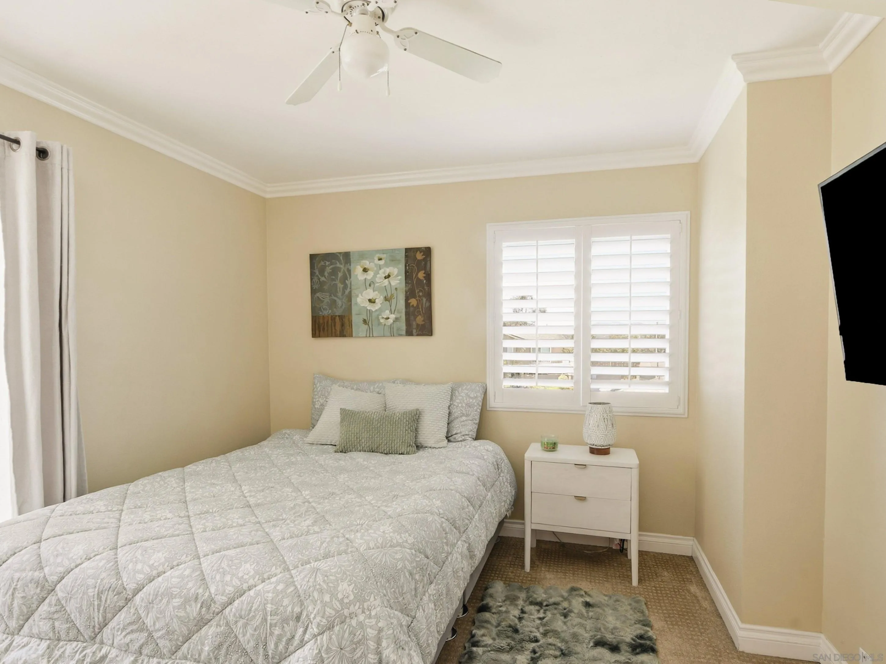 17443 Ashburton Road San Diego, CA 92128 - Photo 26 of 36 a bedroom with a bed and a window