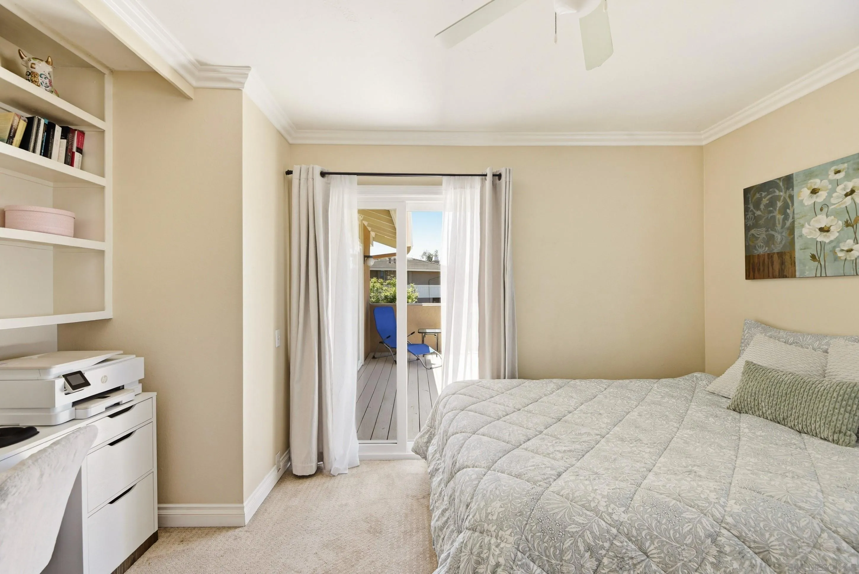 17443 Ashburton Road San Diego, CA 92128 - Photo 27 of 36 a bedroom with a bed and a cabinets