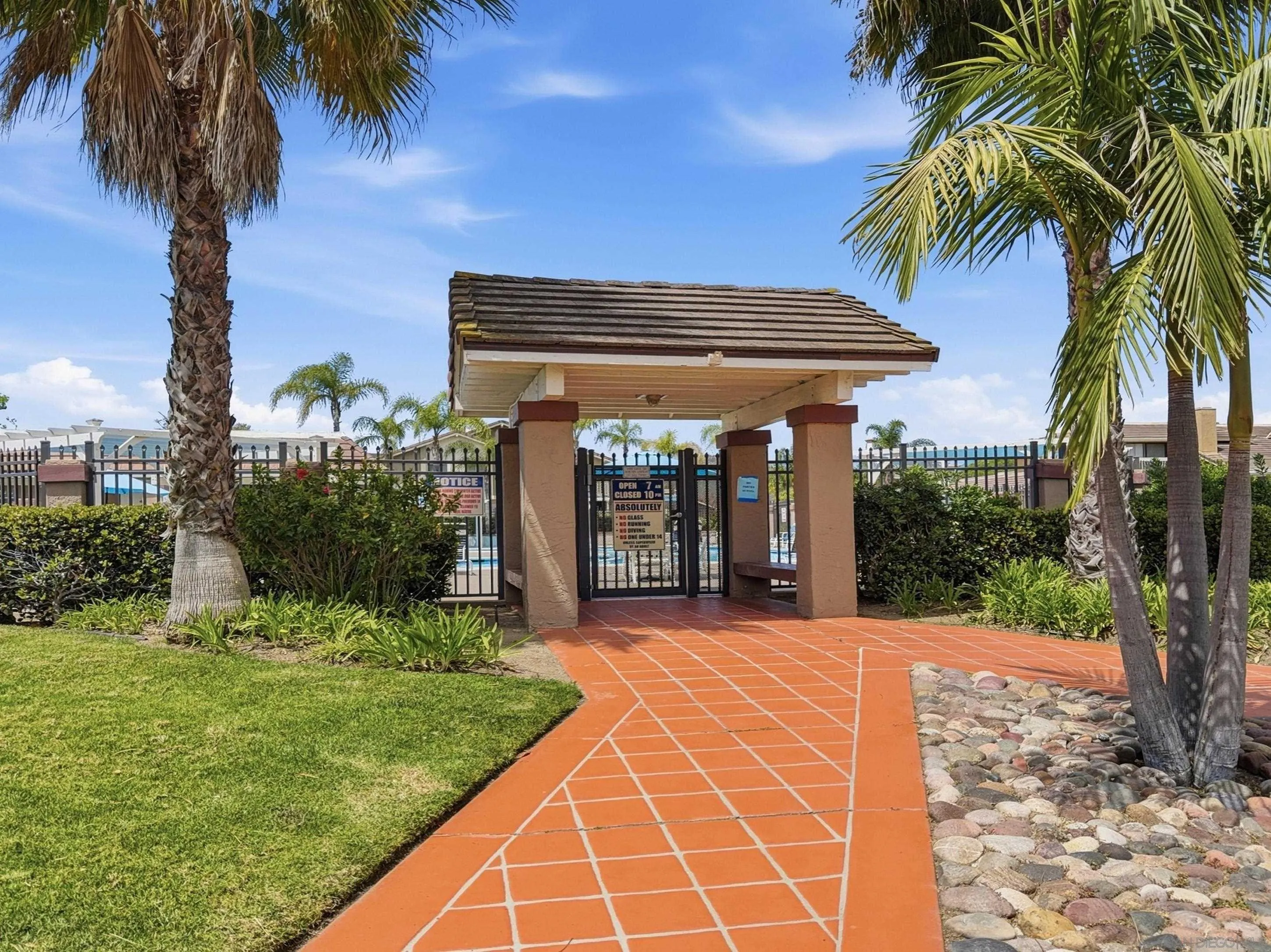 17443 Ashburton Road San Diego, CA 92128 - Photo 30 of 36 a view of a house with palm trees