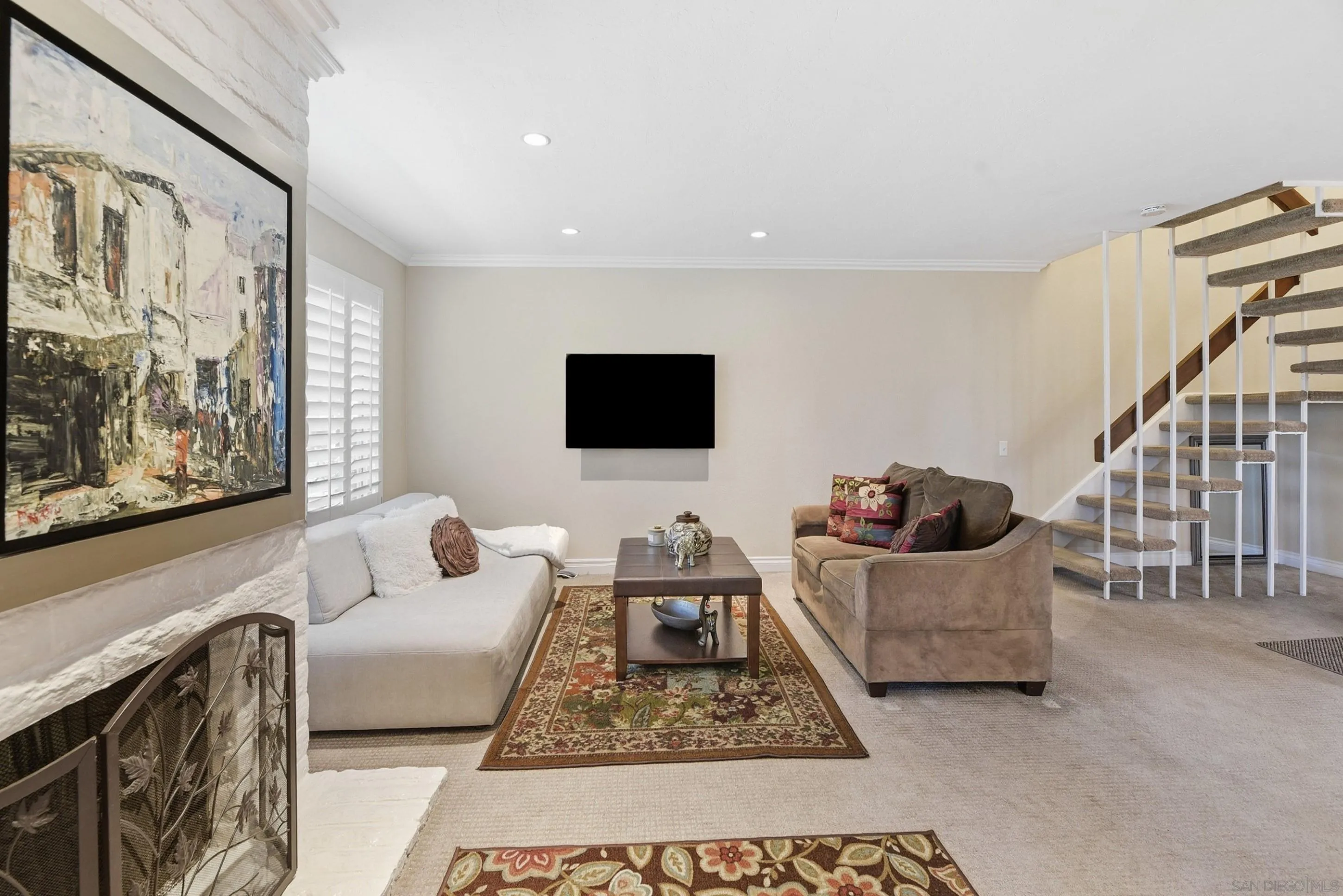 17443 Ashburton Road San Diego, CA 92128 - Photo 3 of 36 a living room with furniture and a flat screen tv