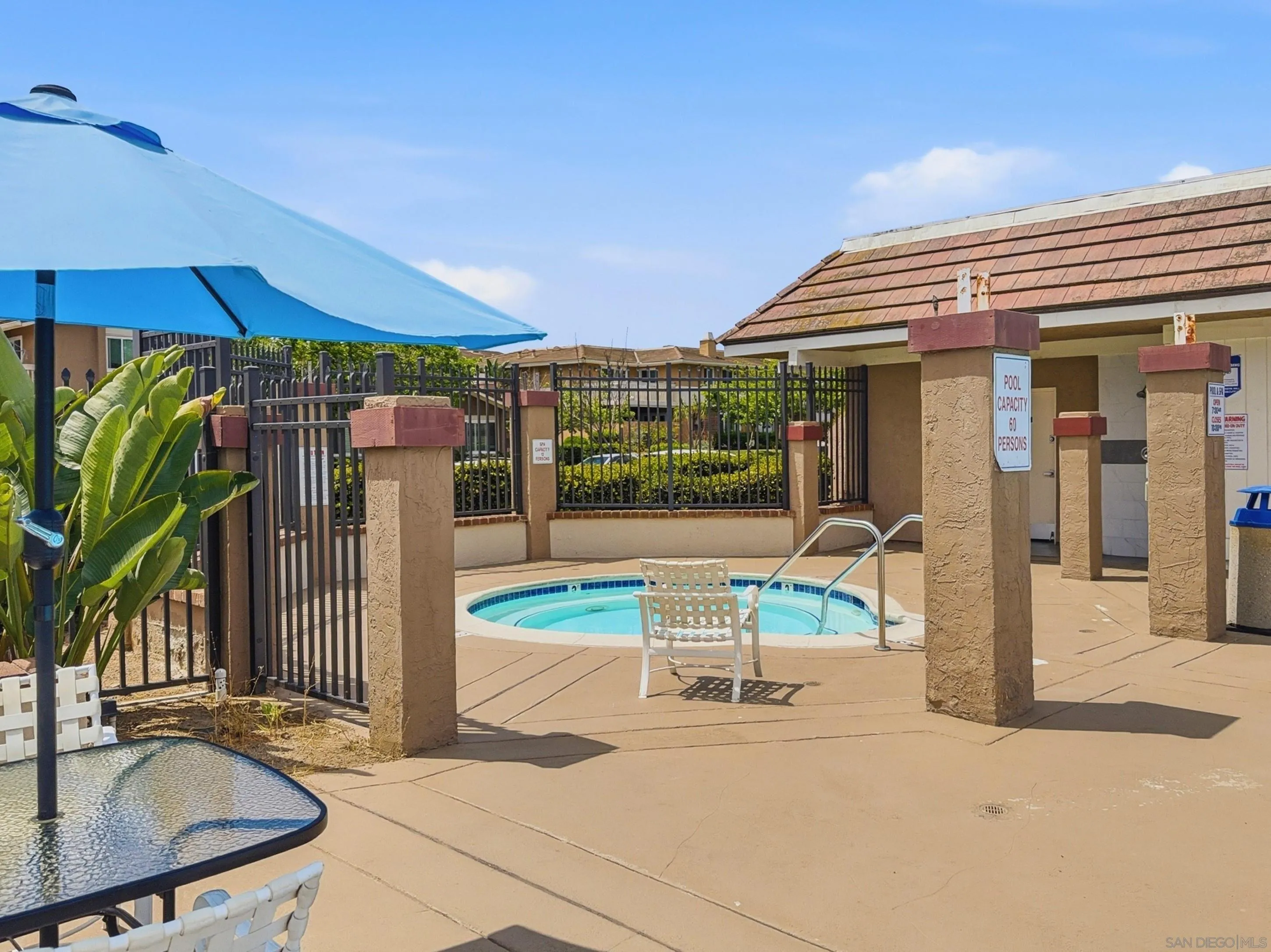 17443 Ashburton Road San Diego, CA 92128 - Photo 31 of 36 a view of a patio with a table and chairs