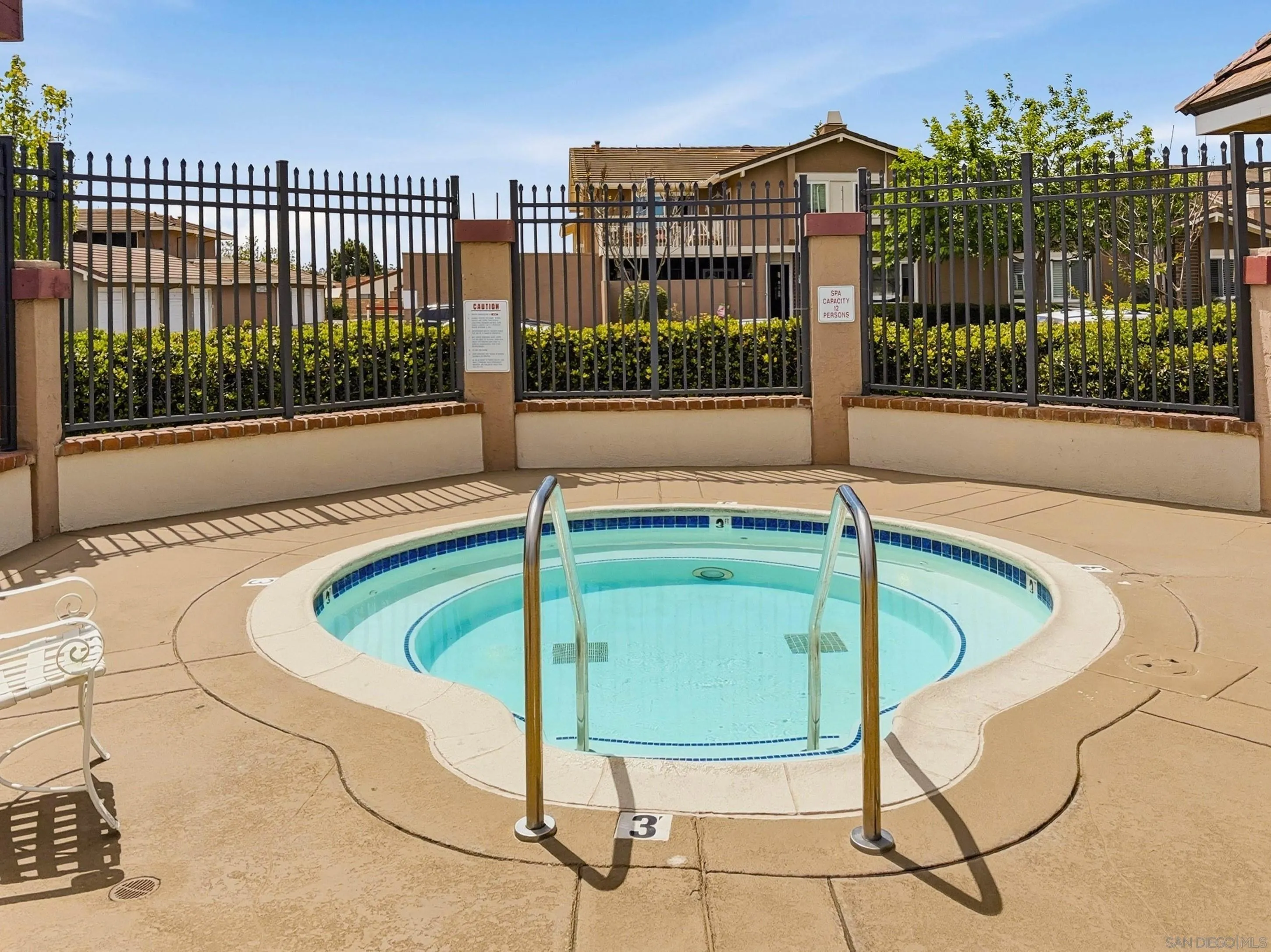 17443 Ashburton Road San Diego, CA 92128 - Photo 32 of 36 a view of a swimming pool with a patio
