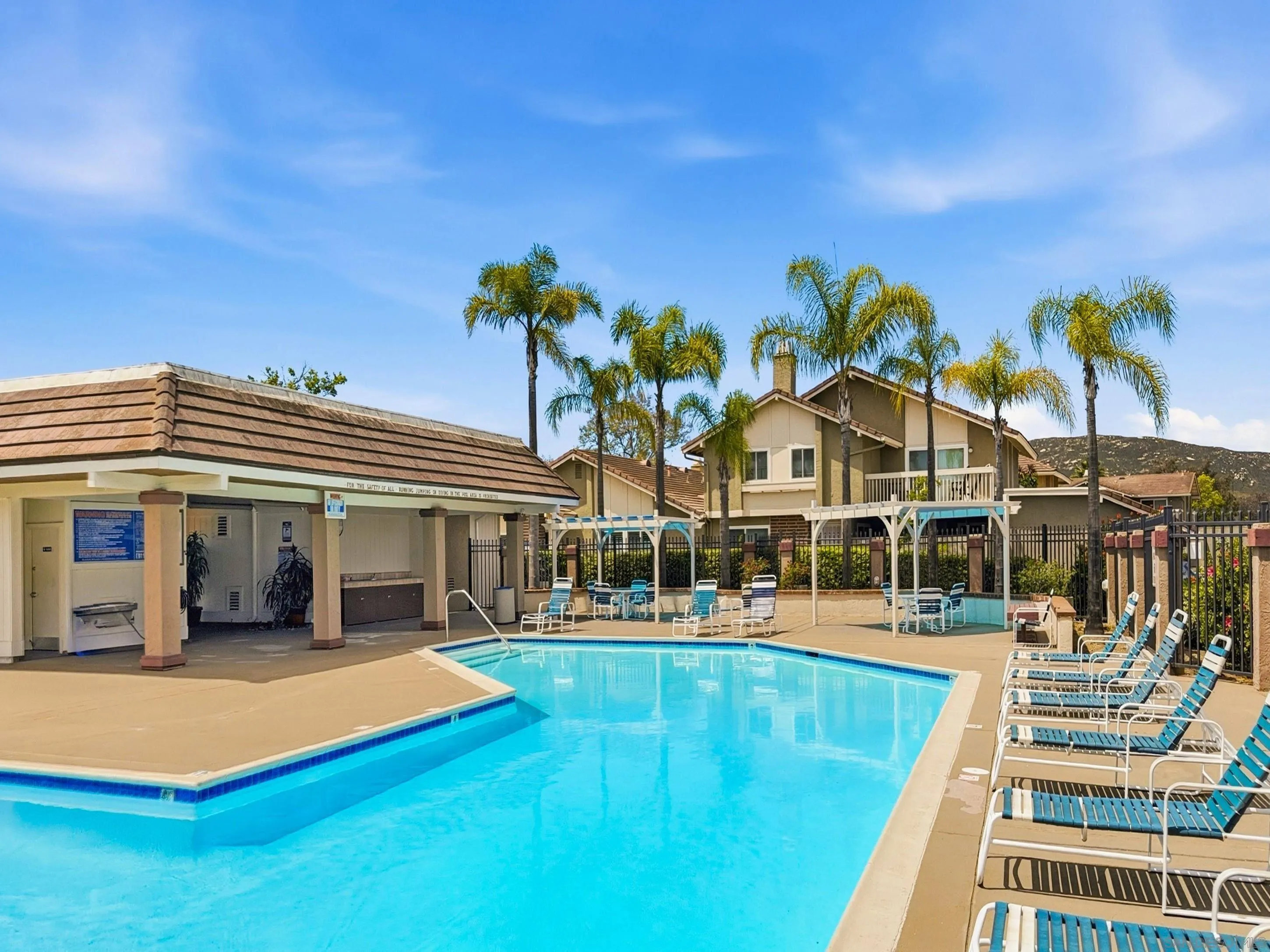 17443 Ashburton Road San Diego, CA 92128 - Photo 34 of 36 a view of house with outdoor space and swimming pool