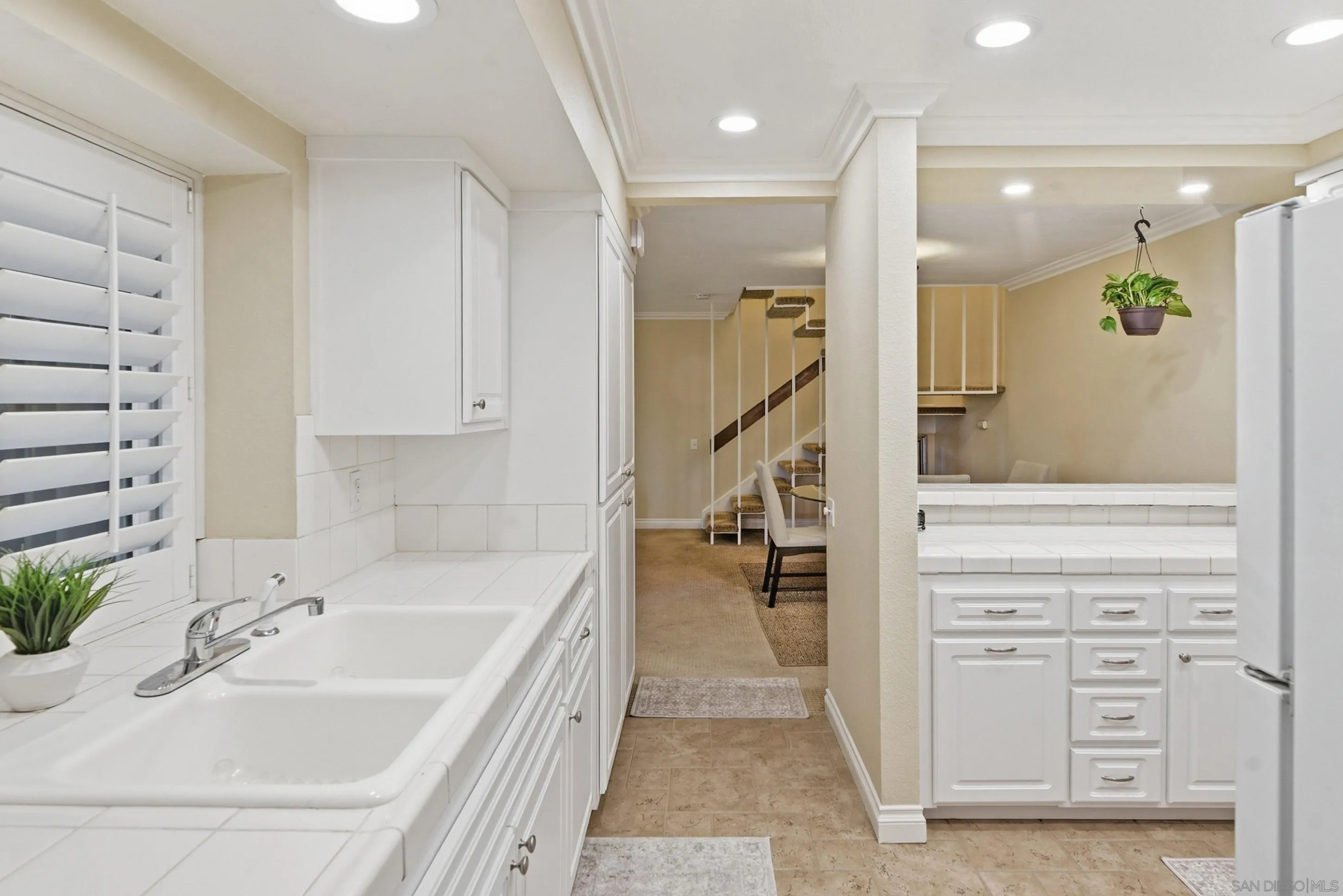 17443 Ashburton Road San Diego, CA 92128 - Photo 9 of 36 a bathroom with a bathtub and a sink