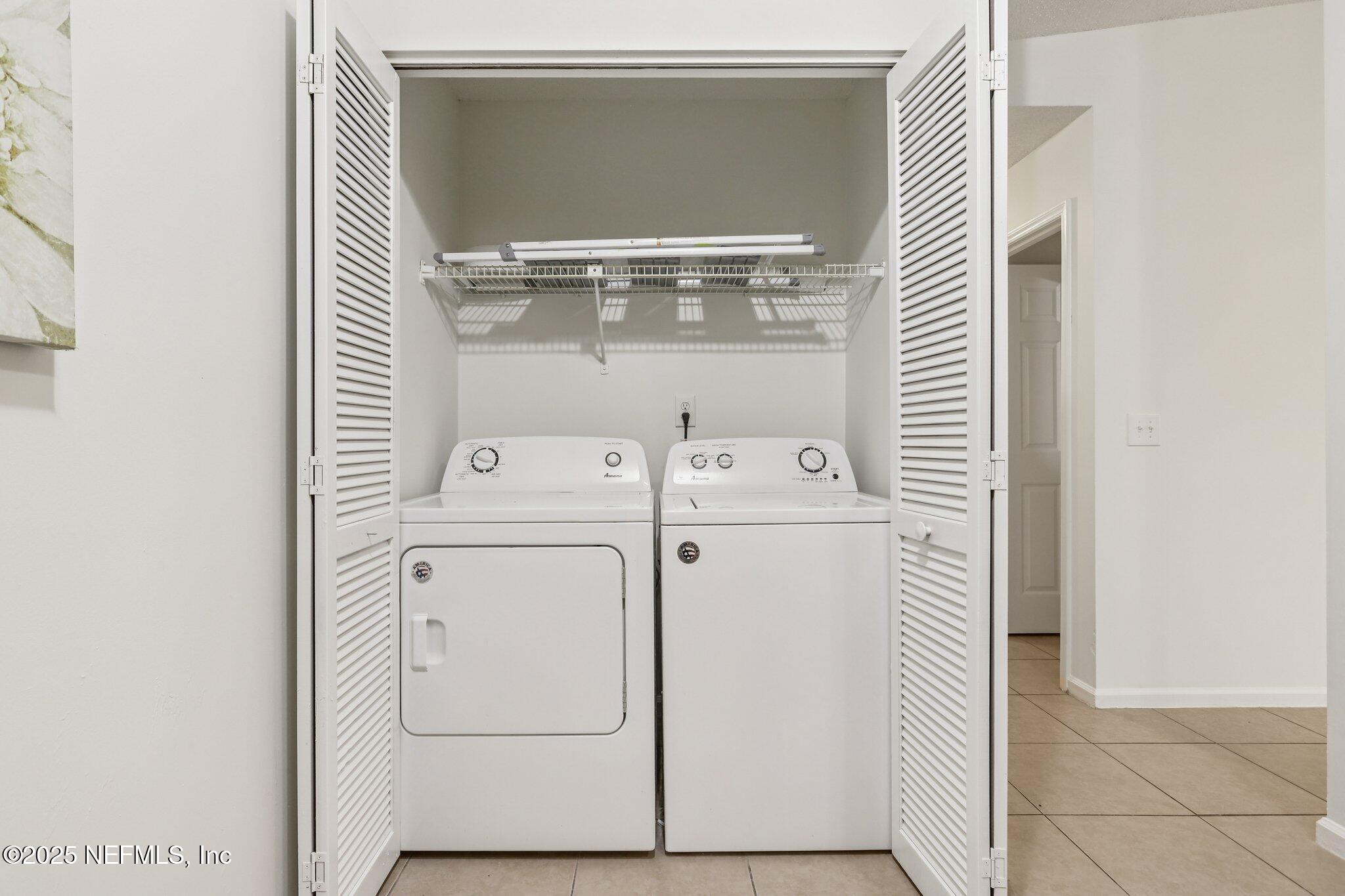 3801 Crown Point Road, Unit 2024 Jacksonville, FL 32257 - Photo 20 of 36 a utility room with dryer and washer