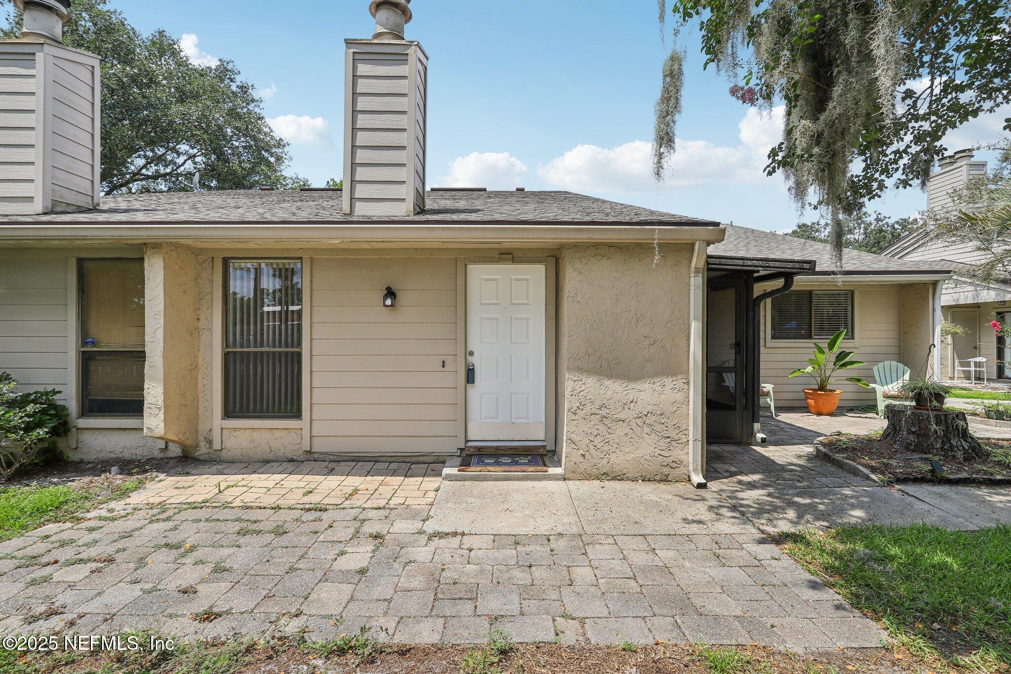 3801 Crown Point Road, Unit 2024 Jacksonville, FL 32257 - Photo 2 of 36 a front view of a house