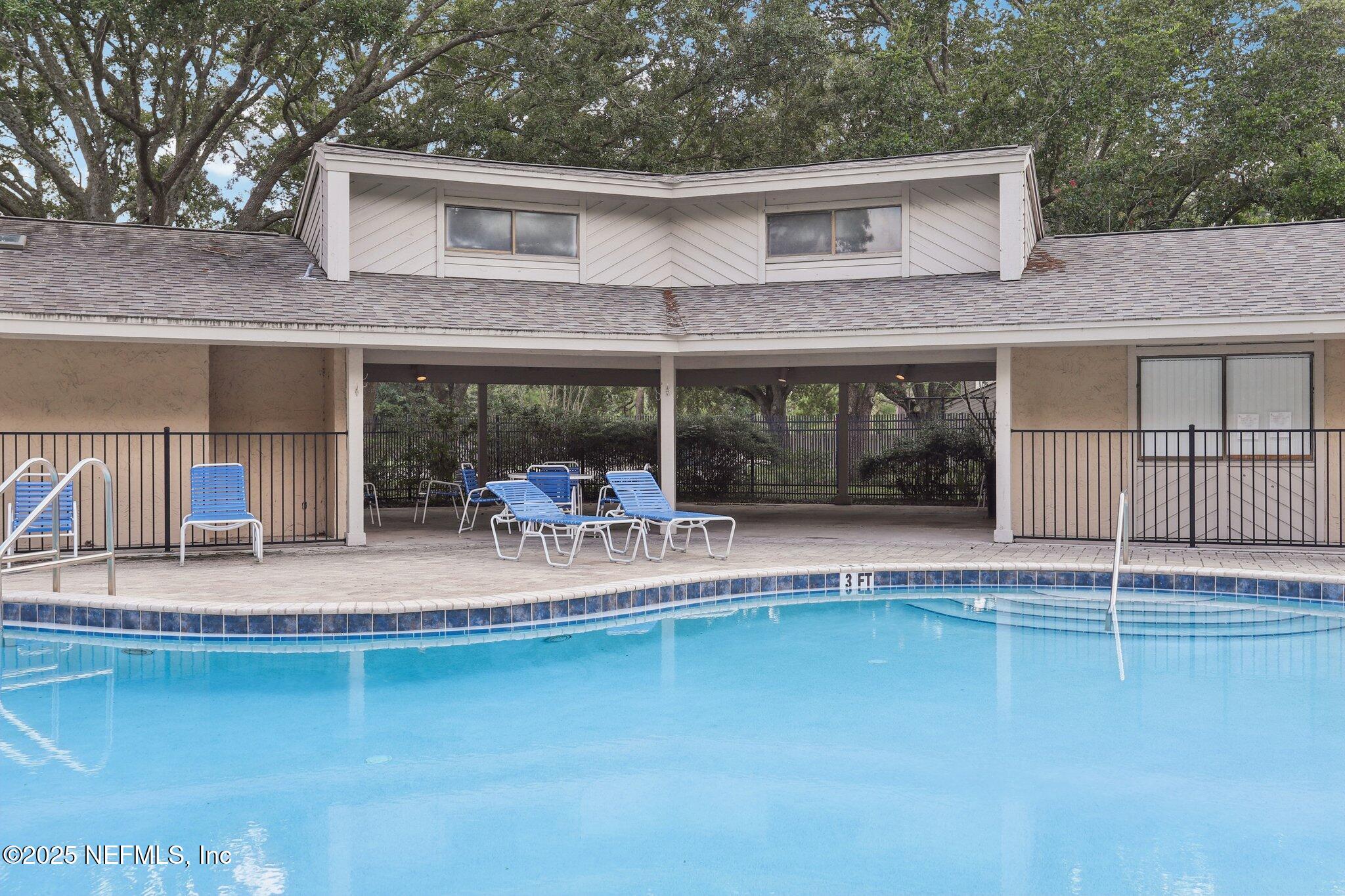 3801 Crown Point Road, Unit 2024 Jacksonville, FL 32257 - Photo 30 of 36 a view of house with outdoor space and swimming pool