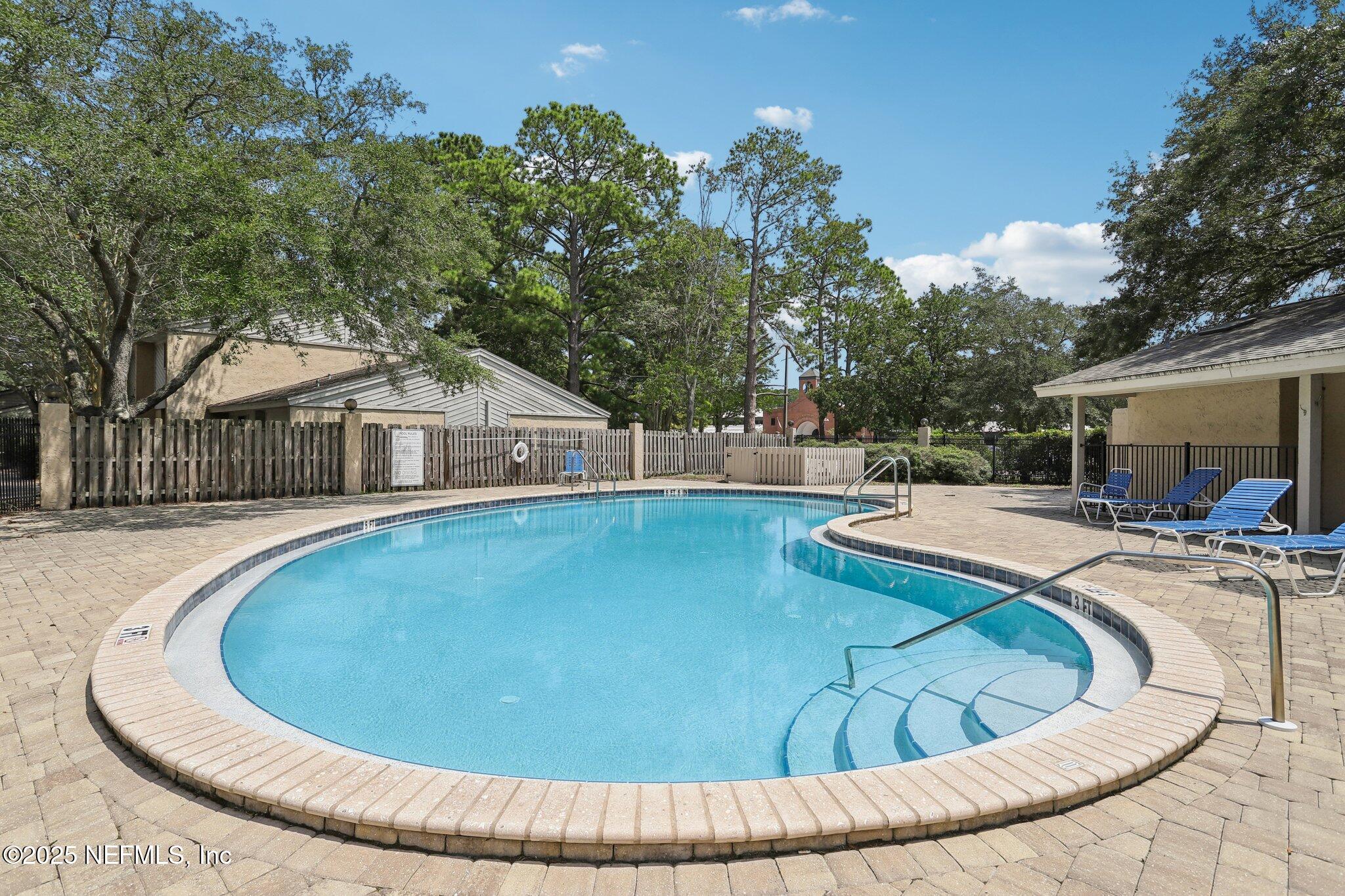 3801 Crown Point Road, Unit 2024 Jacksonville, FL 32257 - Photo 31 of 36 a view of outdoor space and swimming pool