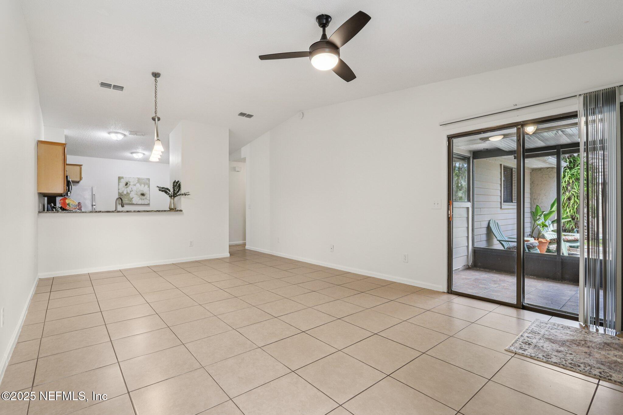 3801 Crown Point Road, Unit 2024 Jacksonville, FL 32257 - Photo 5 of 36 a view of an empty room and window