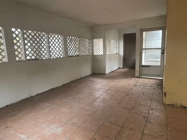 an empty room with windows