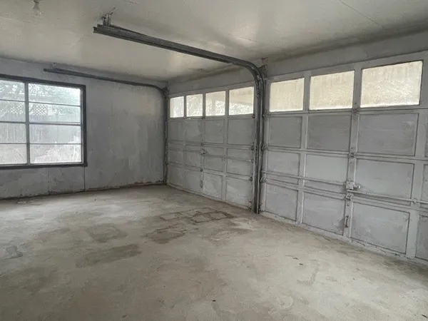 an empty room with windows