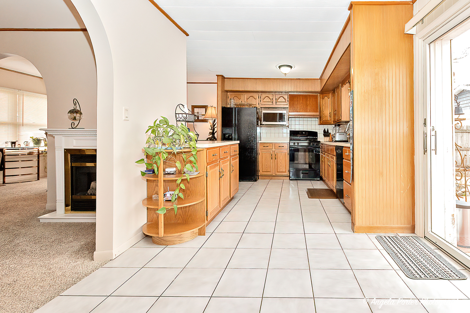 390 Willow Road Wauconda, IL 60084 - Photo 14 of 26 a kitchen with stainless steel appliances a refrigerator and a stove