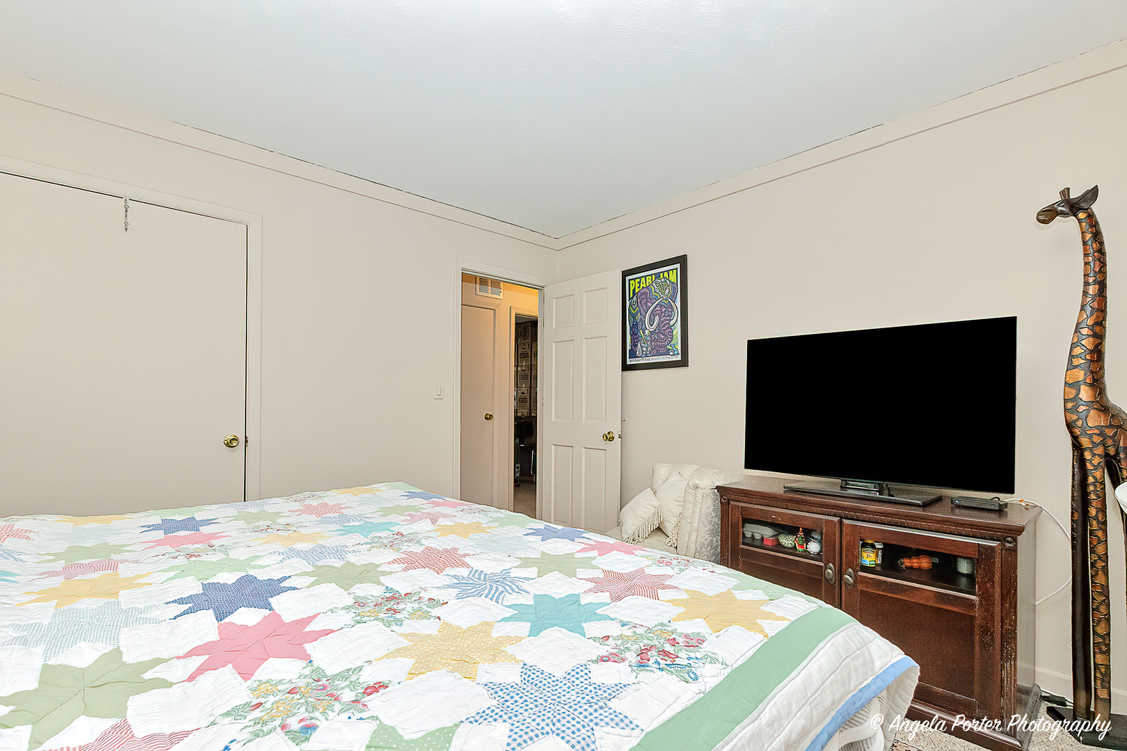 390 Willow Road Wauconda, IL 60084 - Photo 16 of 26 a bedroom with a bed and a flat screen tv
