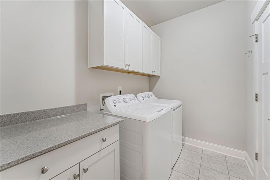 920 Traditions Way Jefferson, GA 30549 - Photo 30 of 40 a utility room with dryer and washer