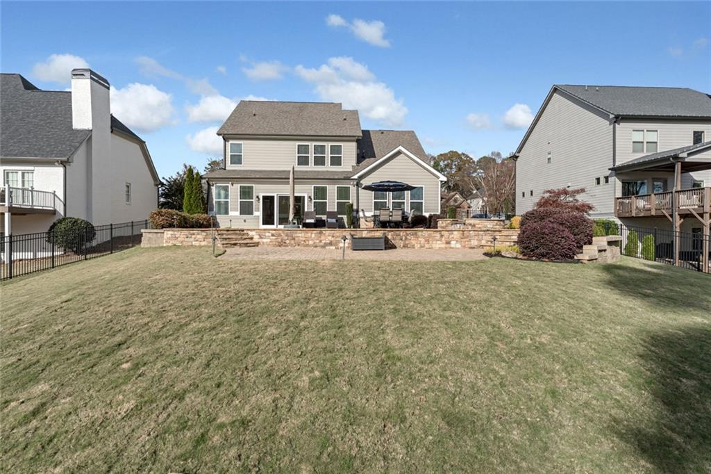 920 Traditions Way Jefferson, GA 30549 - Photo 5 of 40 a front view of a house with a yard