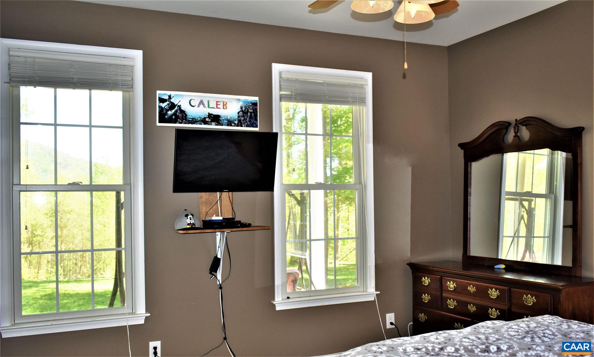 1333 Middle River Road Stanardsville, VA 22973 - Photo 12 of 31 a bedroom with a bed and a window