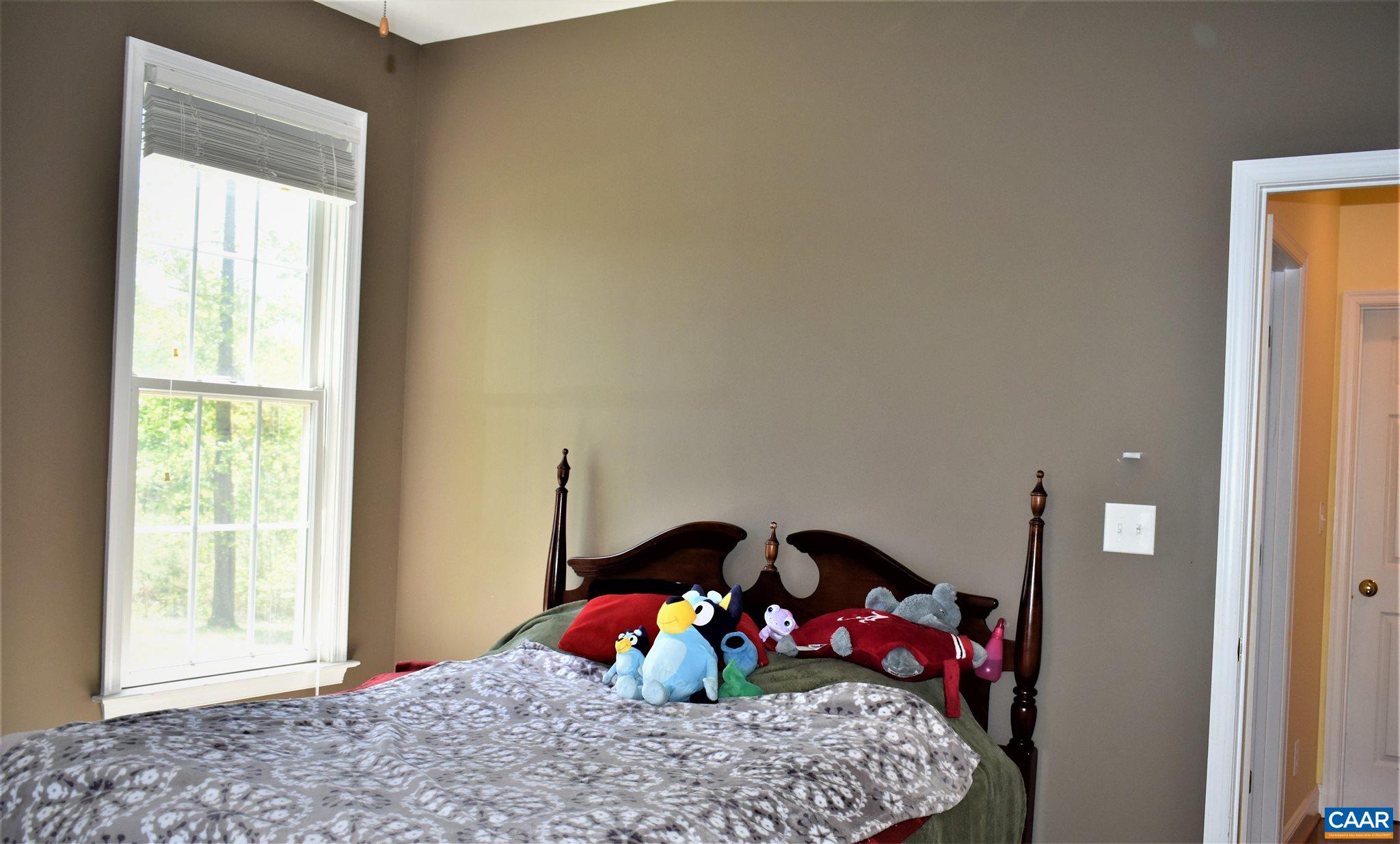 1333 Middle River Road Stanardsville, VA 22973 - Photo 13 of 31 a bedroom with a bed and a window