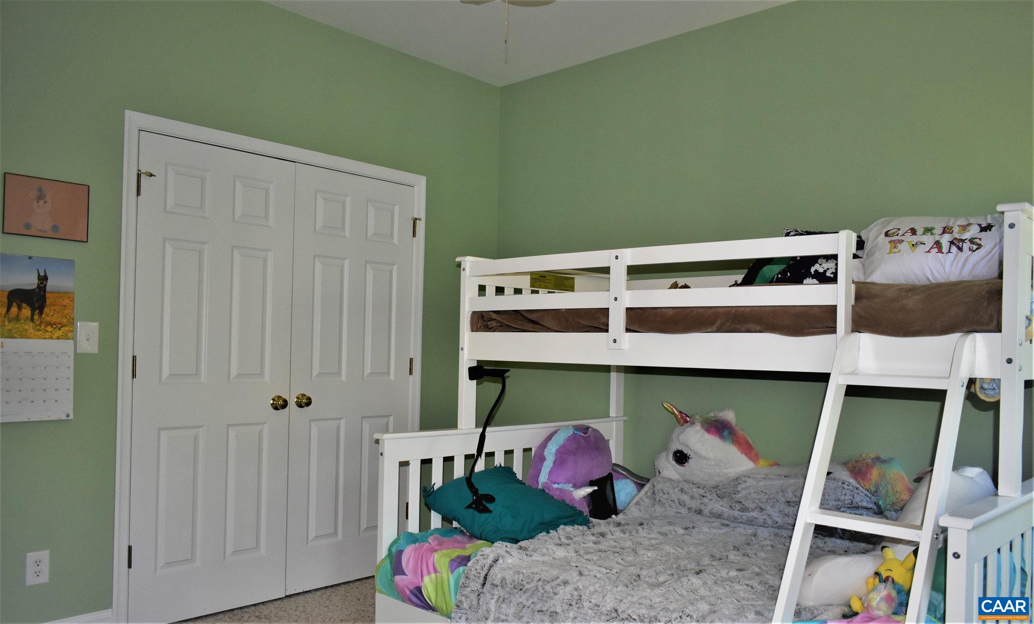 1333 Middle River Road Stanardsville, VA 22973 - Photo 10 of 31 a bed room with a bed and two windows