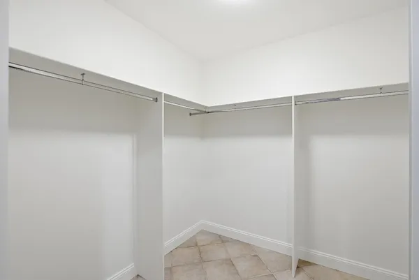 a view of an empty walk in closet