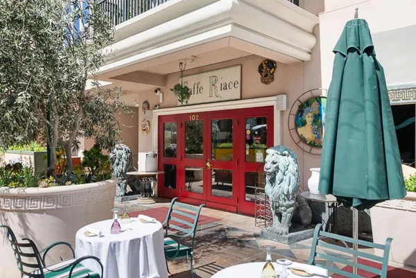 a view of an chairs and tables in the patio