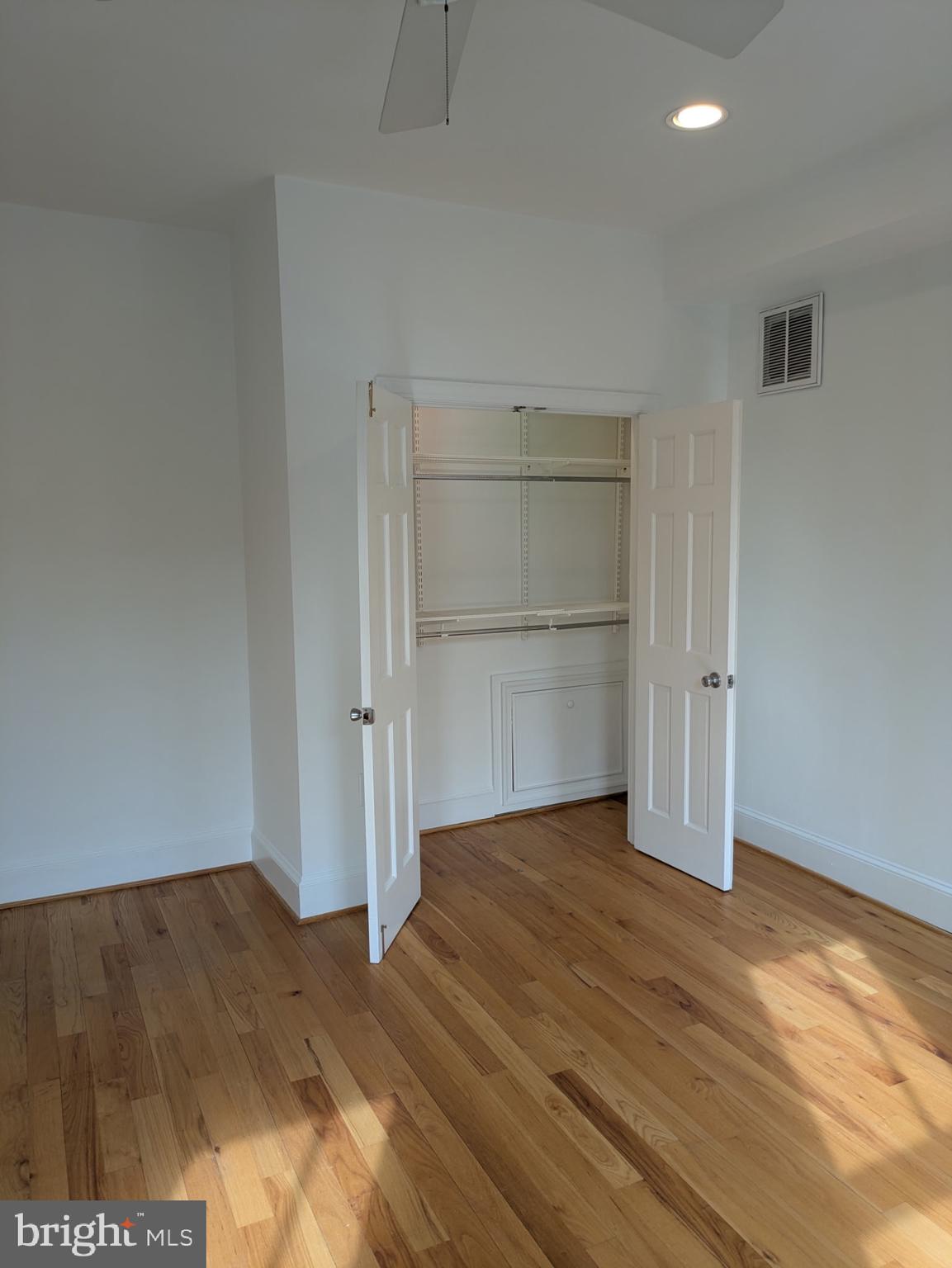 1421 Q Street Northwest, Unit 1 Washington, DC 20009 - Photo 11 of 19 a view of empty room with wooden floor