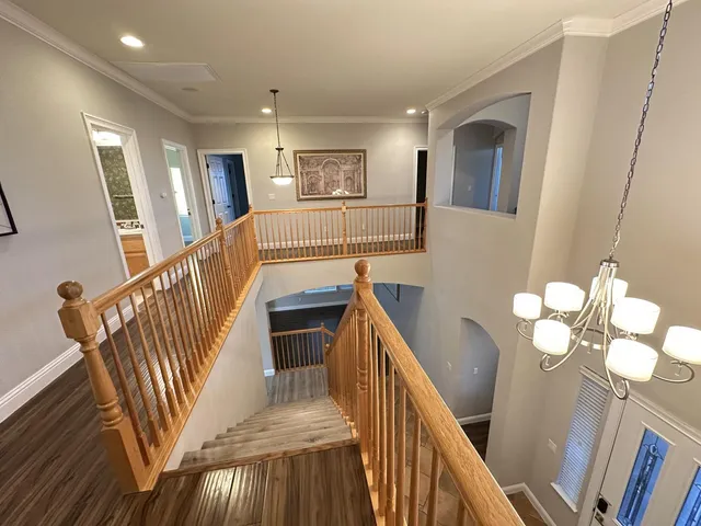 a view of entryway with wooden floor