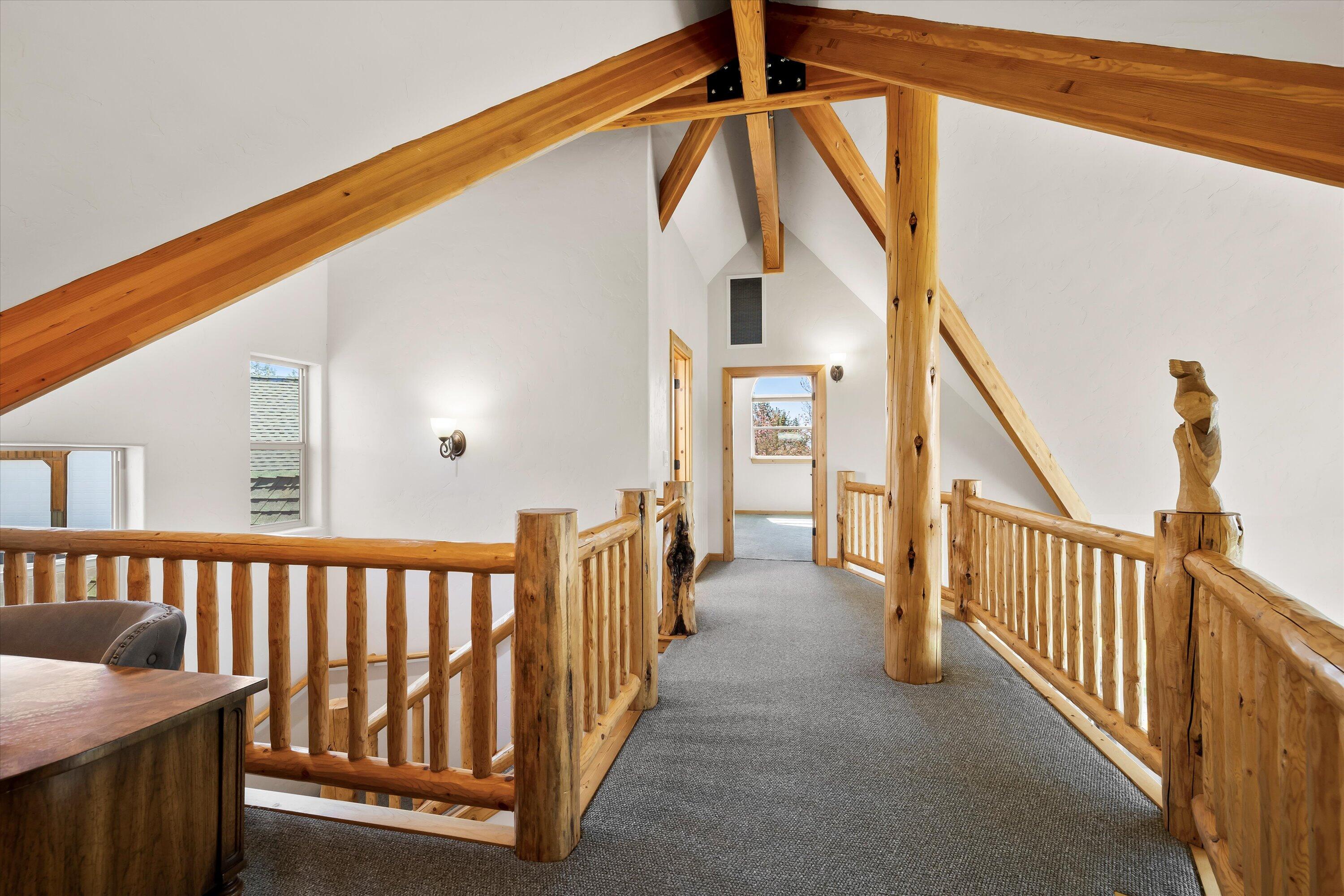 69125 Hurtley Ranch Road Sisters, OR 97759 - Photo 33 of 77 An upstairs spacious loft provides an ideal office nook & leads to two guestrooms with cozy reading dormers, full bath & glistening mountain views
