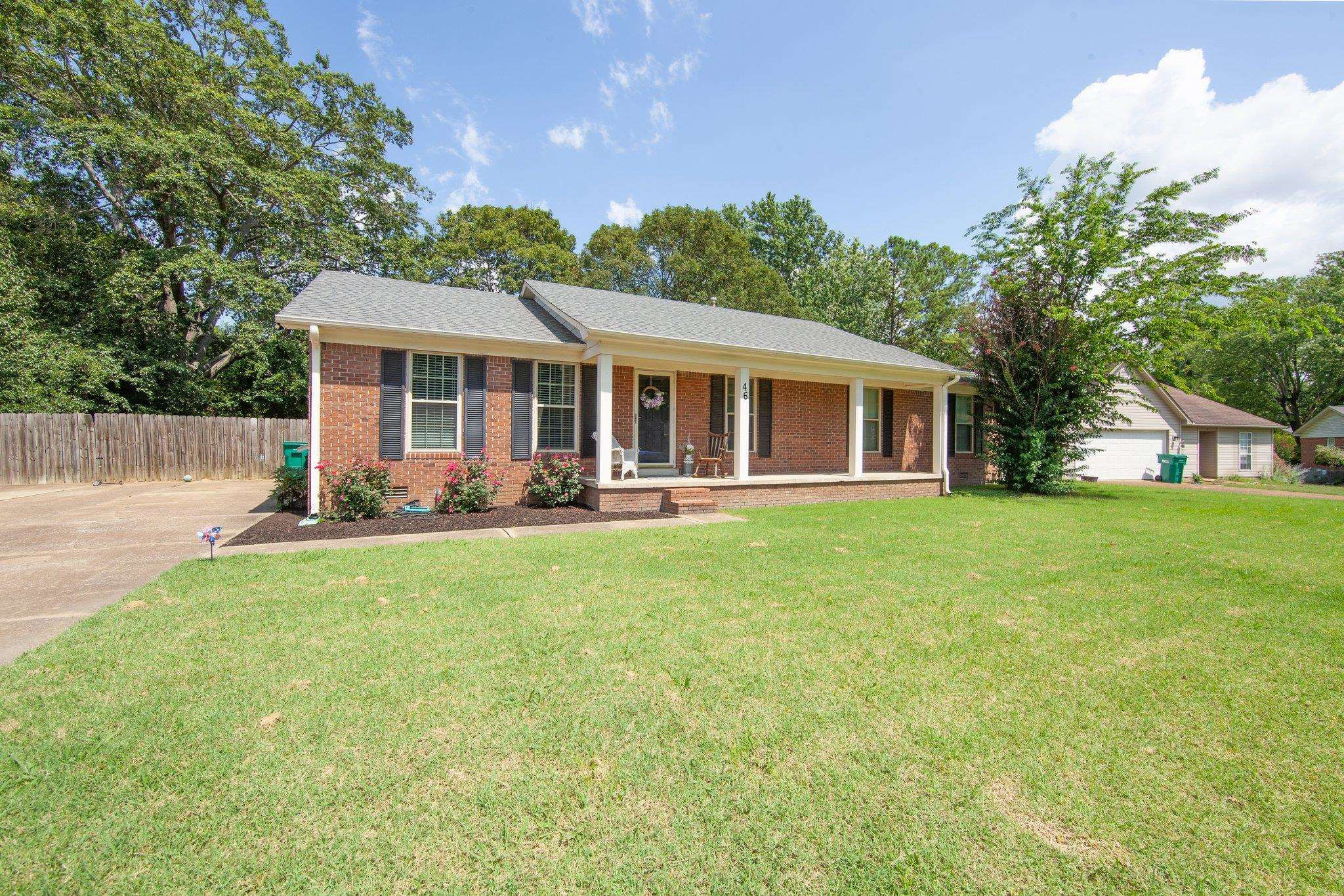 46 Commanche Cove Jackson, TN 38305 - Photo 2 of 29 a view of a house with a backyard and a patio