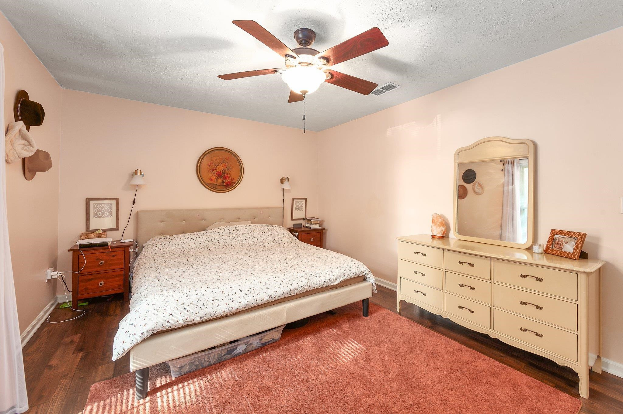 46 Commanche Cove Jackson, TN 38305 - Photo 23 of 29 a bedroom with a bed and cabinets