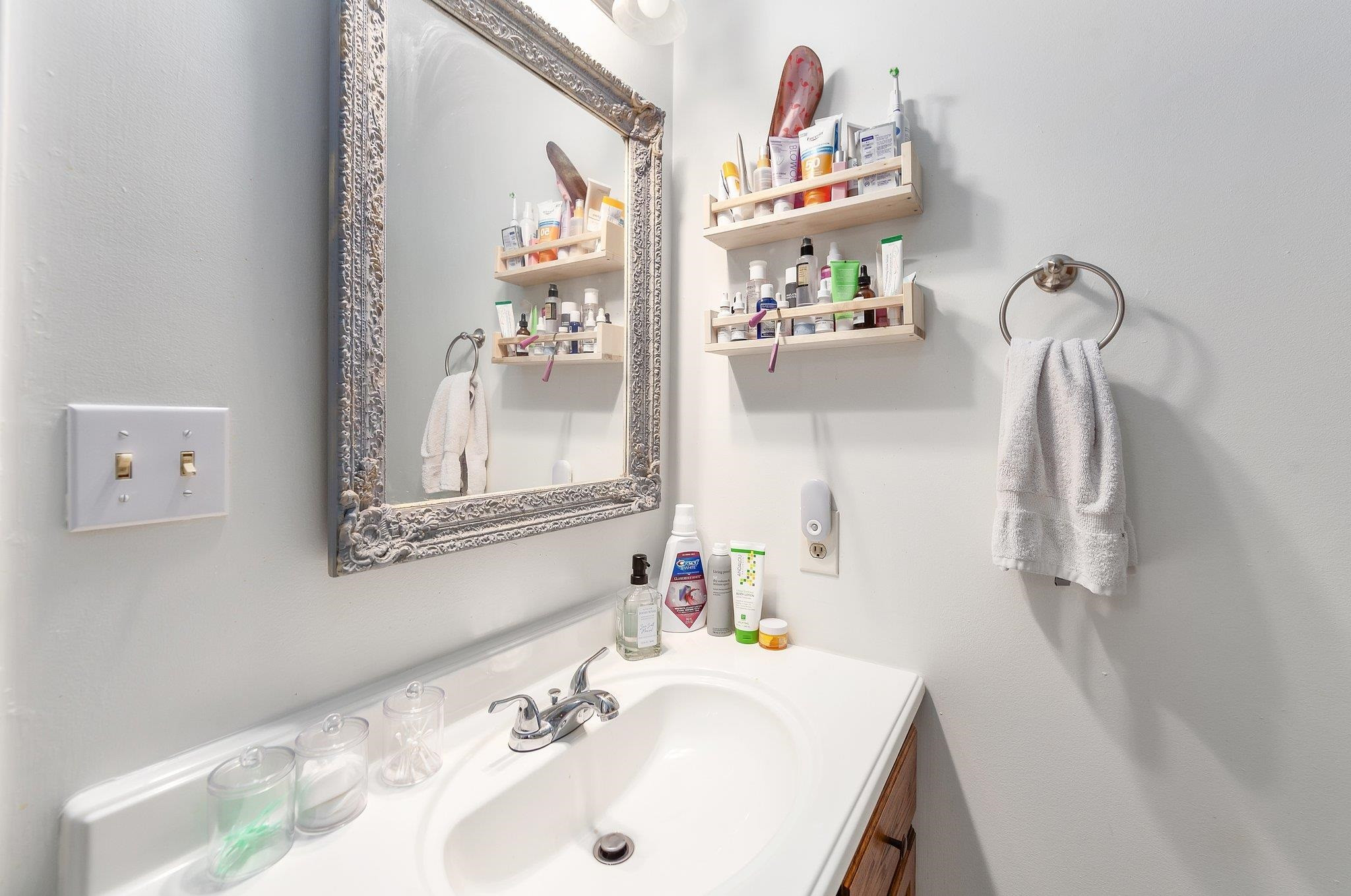 46 Commanche Cove Jackson, TN 38305 - Photo 29 of 29 a bathroom with a sink and mirror