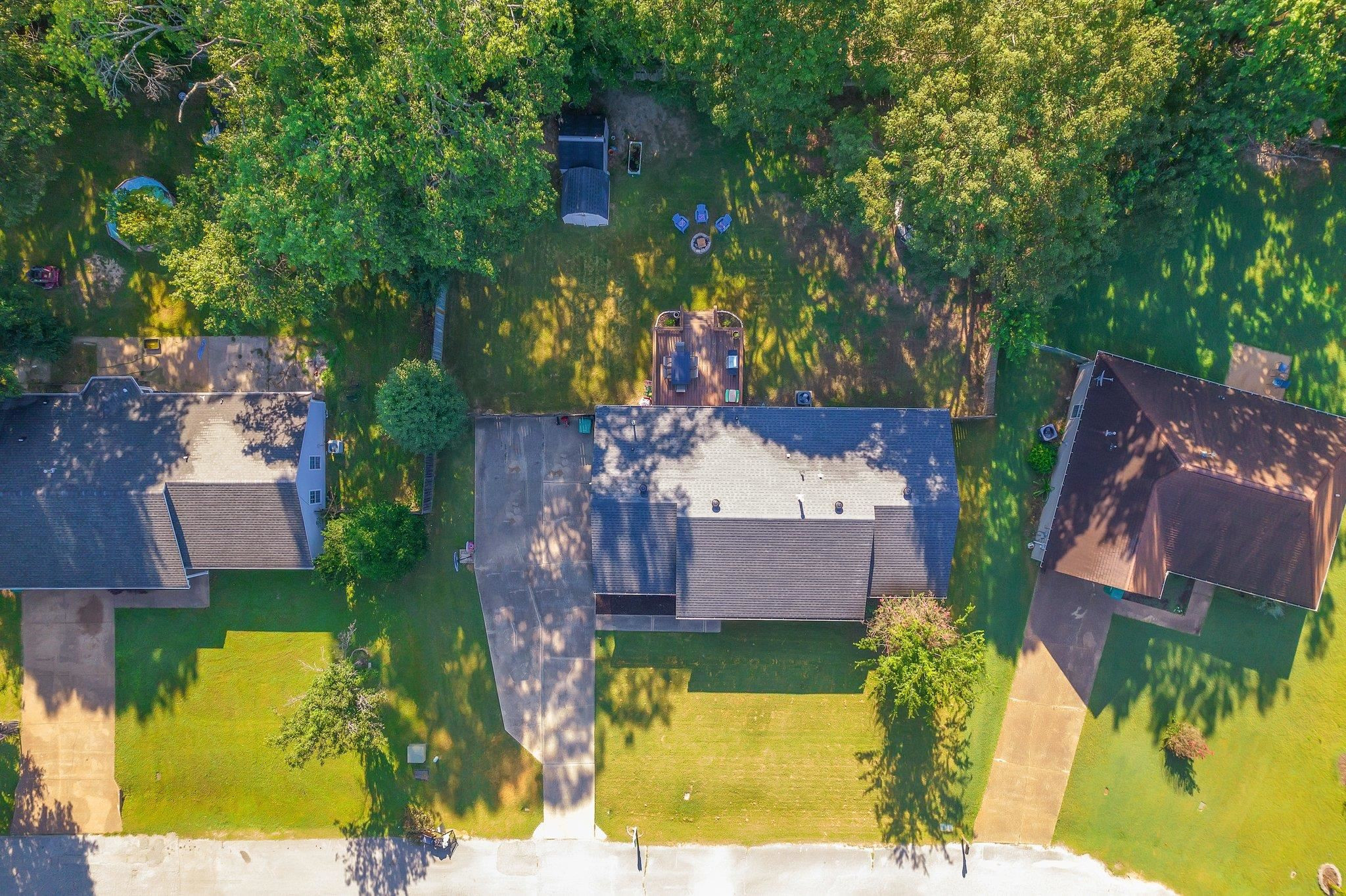 46 Commanche Cove Jackson, TN 38305 - Photo 4 of 29 an aerial view of a house with a yard basket ball court and outdoor seating