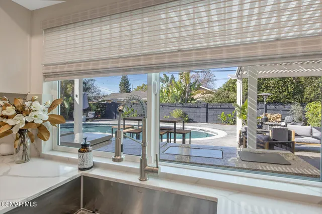 a view of a living room with furniture