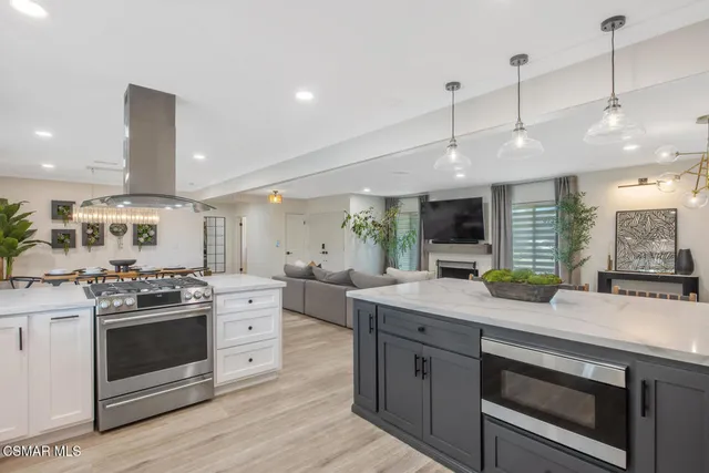a kitchen with a stove and a sink