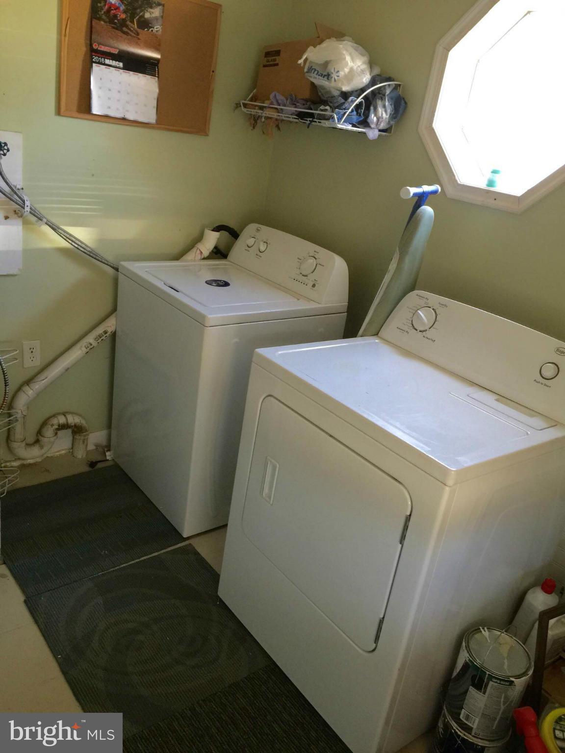 8 Ridgemoor Road Baltimore, MD 21221 - Photo 12 of 13 a utility room with dryer and washer