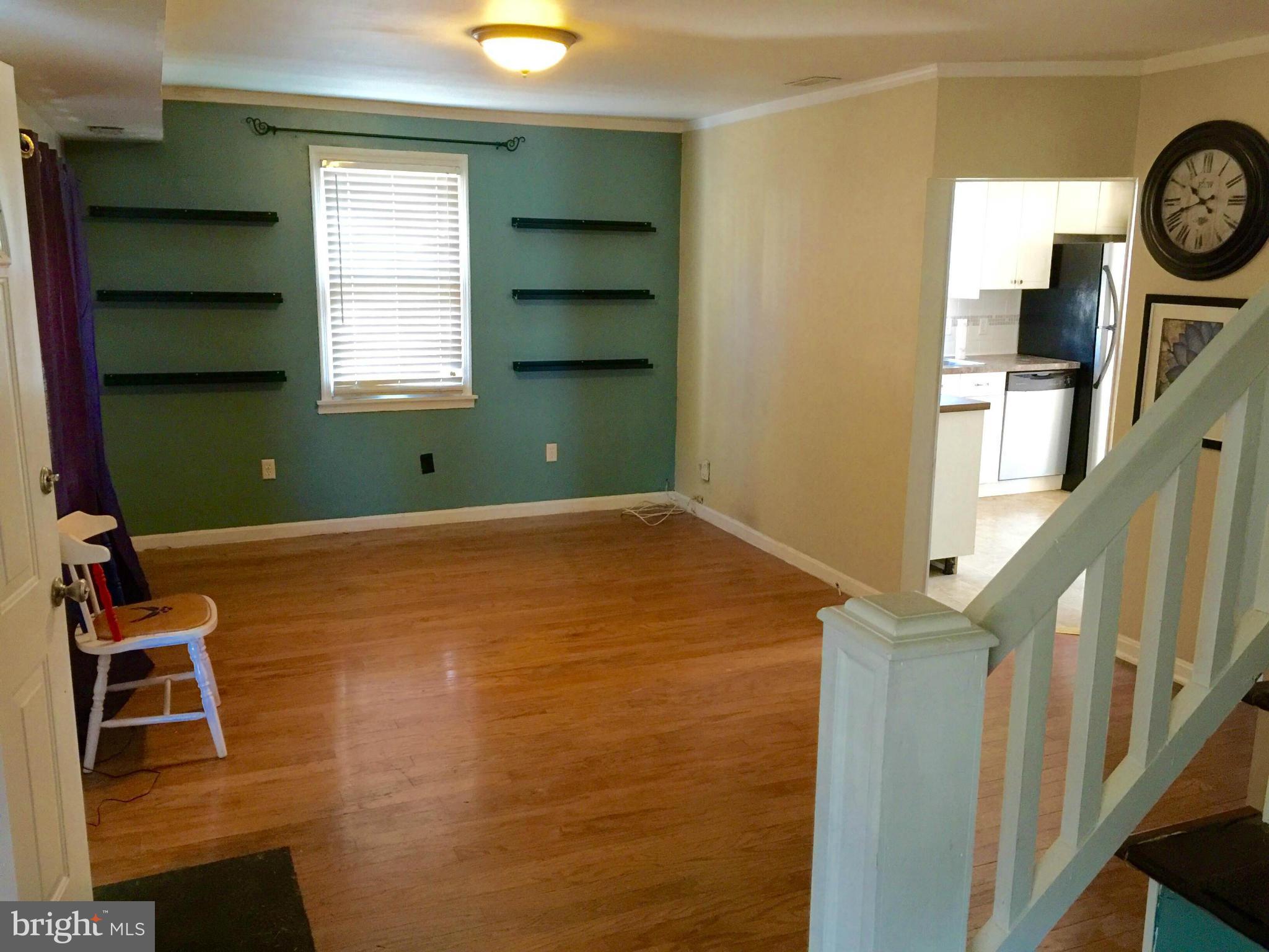 8 Ridgemoor Road Baltimore, MD 21221 - Photo 2 of 13 a living room with furniture and a window