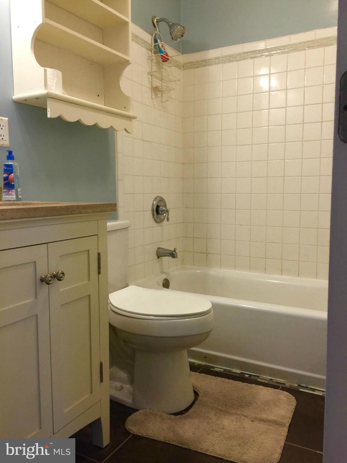 8 Ridgemoor Road Baltimore, MD 21221 - Photo 4 of 13 a bathroom with a toilet a sink and bathtub