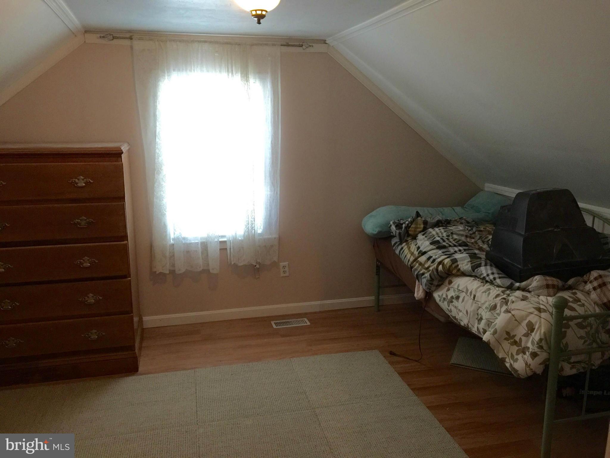 8 Ridgemoor Road Baltimore, MD 21221 - Photo 10 of 13 a living room with furniture and a window