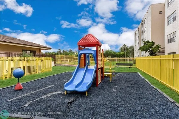 a view of a park with slide