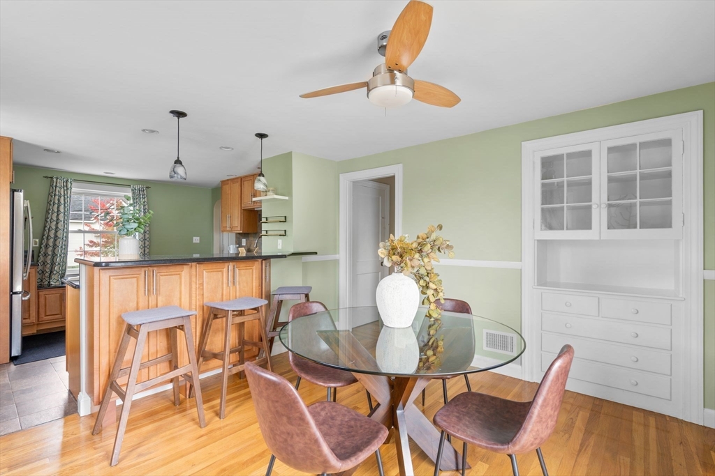 29 Walnut Terrace Arlington, MA 02476 - Photo 11 of 41 a view of a dining room with furniture and wooden floor