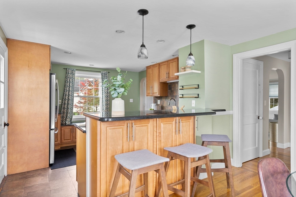 29 Walnut Terrace Arlington, MA 02476 - Photo 12 of 41 a dining room with furniture and window