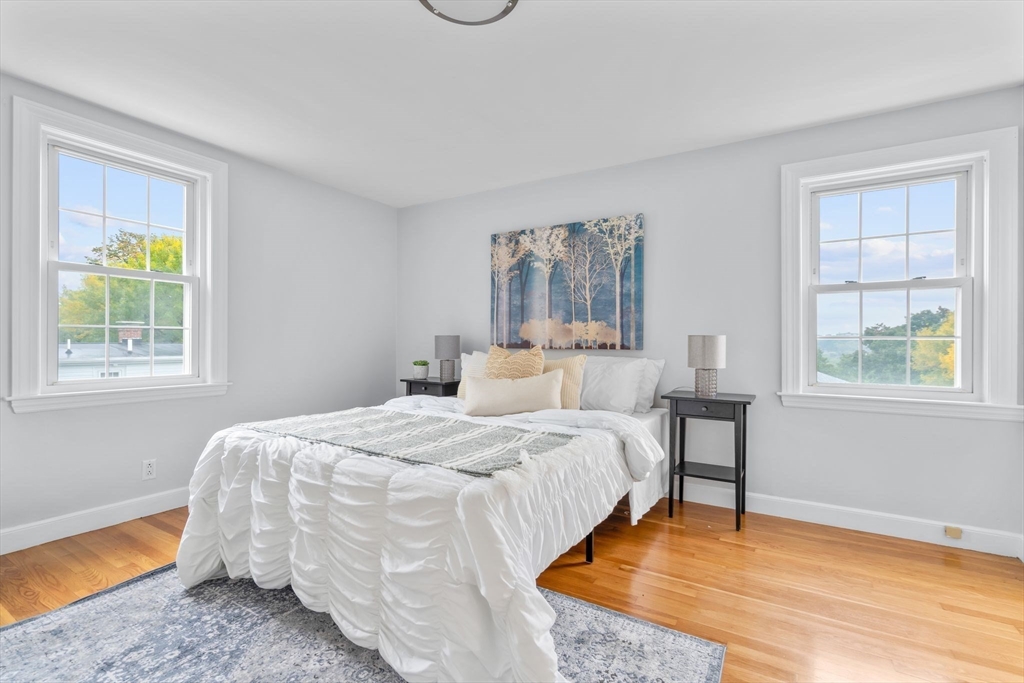 29 Walnut Terrace Arlington, MA 02476 - Photo 21 of 41 a bedroom with a bed and a window