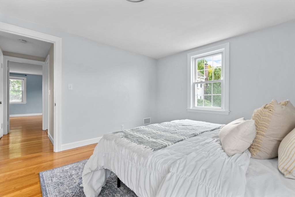 29 Walnut Terrace Arlington, MA 02476 - Photo 22 of 41 a bedroom with a bed and a window