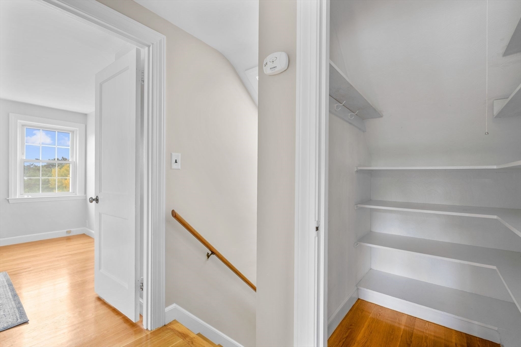 29 Walnut Terrace Arlington, MA 02476 - Photo 26 of 41 a view of a hallway with wooden floor and entryway