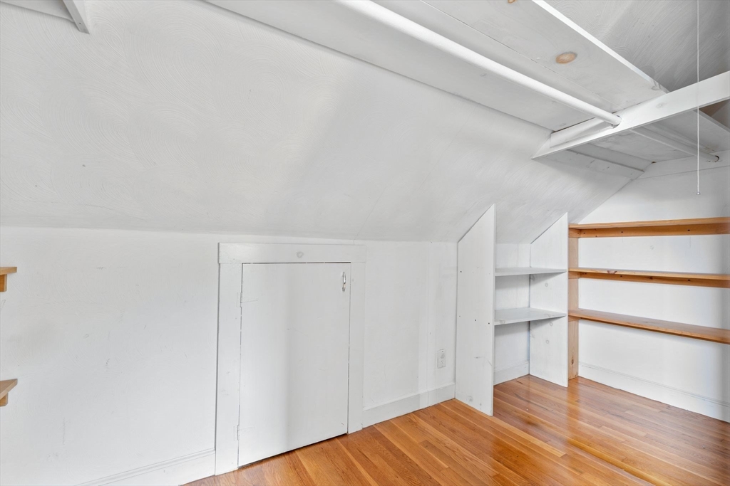 29 Walnut Terrace Arlington, MA 02476 - Photo 28 of 41 a view of an empty room with wooden floor