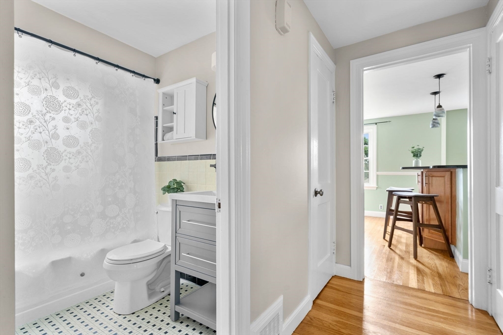 29 Walnut Terrace Arlington, MA 02476 - Photo 29 of 41 a bathroom with a toilet a sink and a bathtub