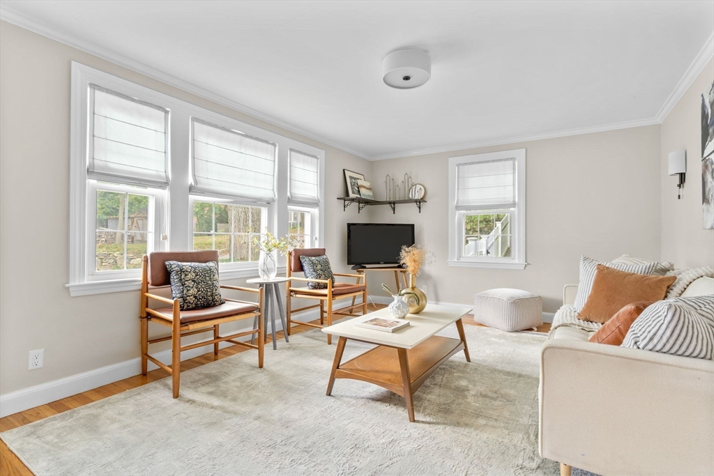 29 Walnut Terrace Arlington, MA 02476 - Photo 3 of 41 a living room with furniture and a flat screen tv
