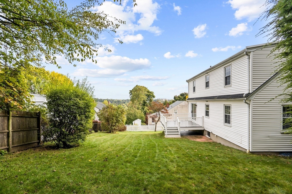 29 Walnut Terrace Arlington, MA 02476 - Photo 38 of 41 a view of a house with backyard and a tree