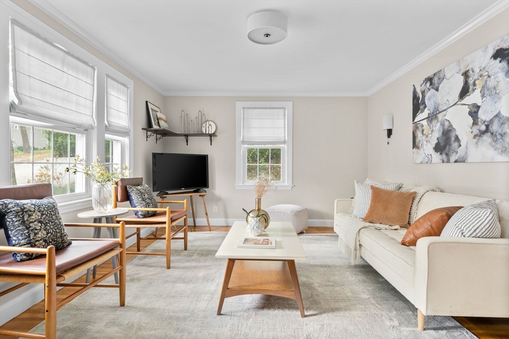 29 Walnut Terrace Arlington, MA 02476 - Photo 4 of 41 a living room with furniture and a flat screen tv