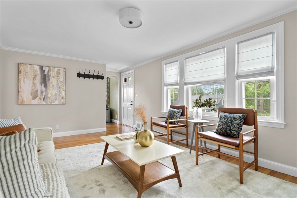 29 Walnut Terrace Arlington, MA 02476 - Photo 6 of 41 a living room with furniture and a large window